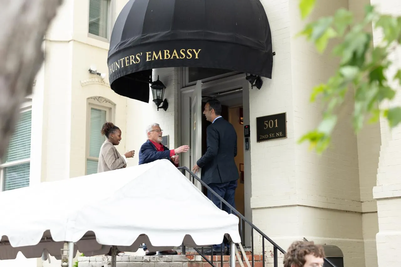 Guests are greeted on the steps of the Hunters’ Embassy, 501 2nd St. NE, Washington, D.C.