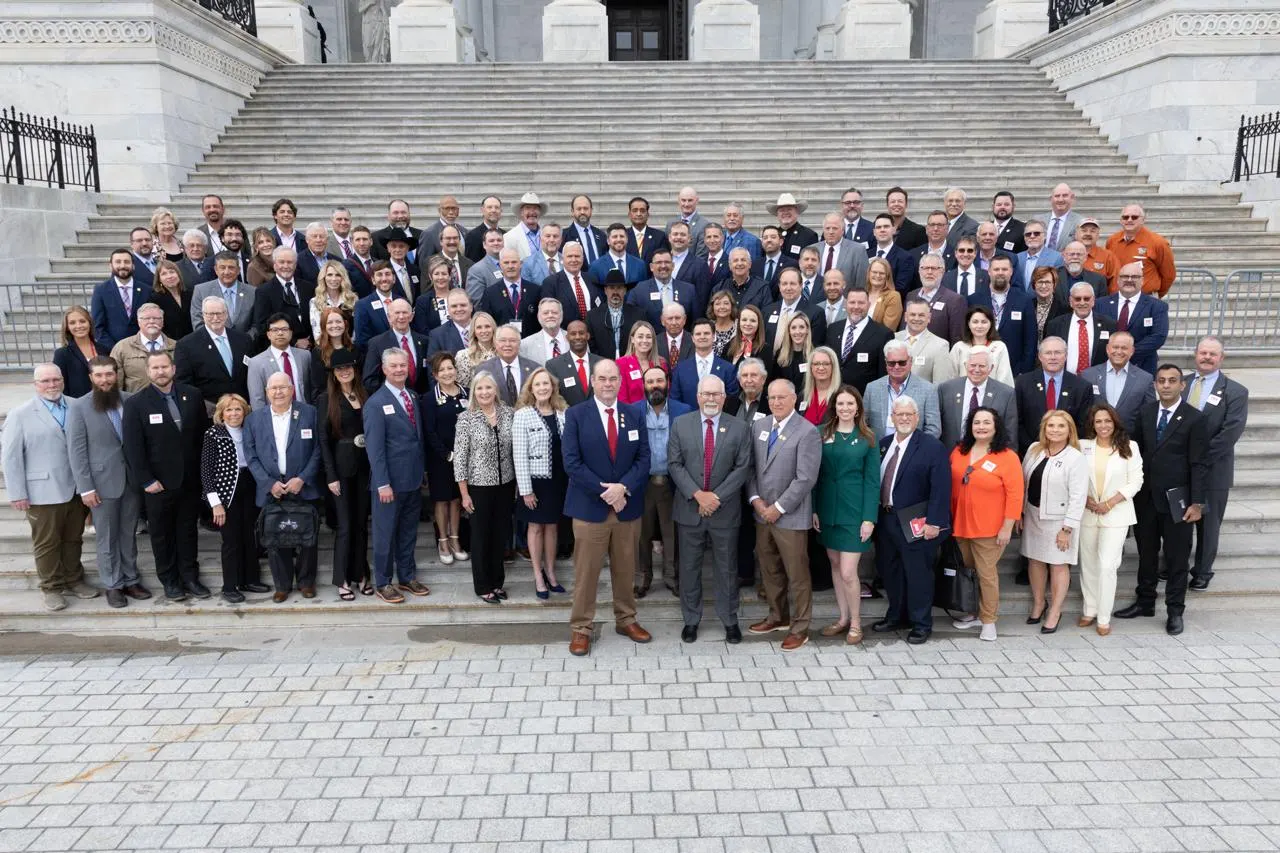 SCI members from around the world gather on the steps of the United States Capitol in Washington, DC.